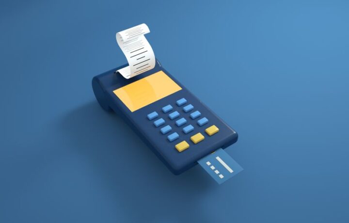 A blue card reader with a receipt printout and inserted card on a blue background.